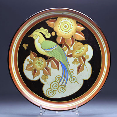 Charles CATTEAU (1880-1966). Boch Keramis dish decorated with lyre birds in mat finish.