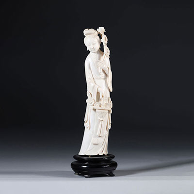 China sculpture of a young woman with a flowered basket circa 1920