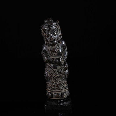 Asia wooden knife handle carved with a deity late 19th