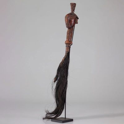 Luba shankadi fly hunter in wood carved with a scarified character early 20th century