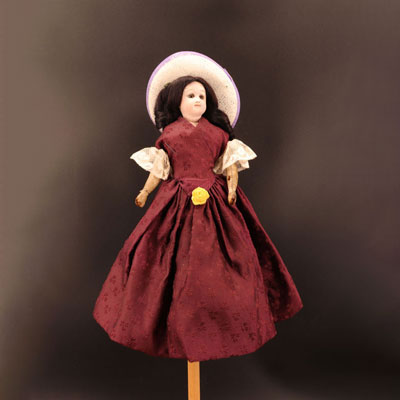 Doll head porcelain closed mouth burgundy dress