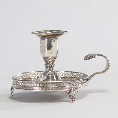 Silver hand candlestick originating from 19th century