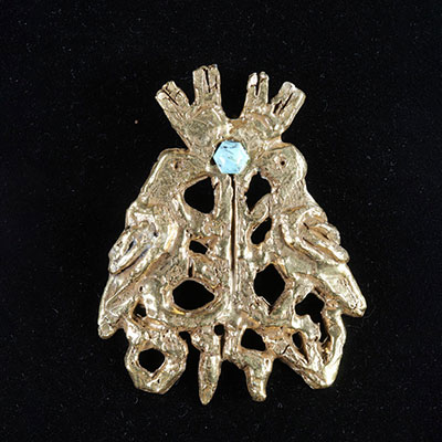 JACQUES LIPCHITZ Brooch / pendant Gilt bronze and octagonal turquoise stone Signed on the back 1970
