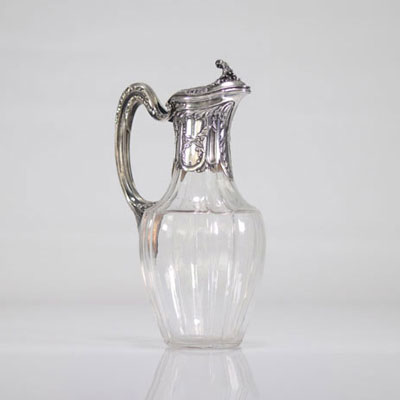 Crystal and silver decanter with floral decoration. XIX th centuries