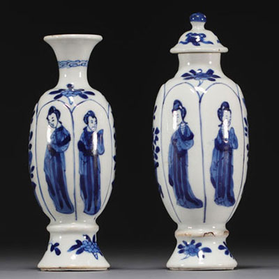 China - Pair of small vases in blue-white porcelain decorated with women, Kangxi period.