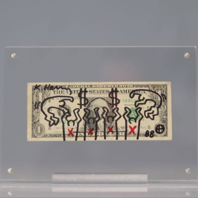 Keith HARING (1958-1990) ONE DOLLAR, 1987 Dessin au marker noir & rouge signé et daté sur un billet de banque d’un dollar