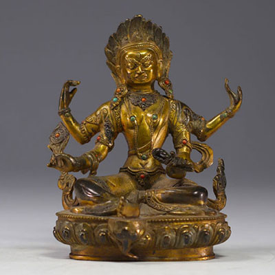 Chine, Tibet - Sculpture en bronze doré avec incrustations de pierres.