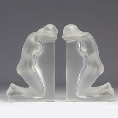 LALIC, France. “Kneeling Naked Women”. Pair of satin white pressed molded glass bookends