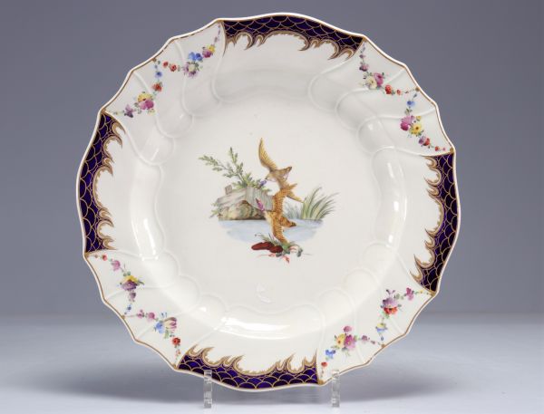 Large dish in Tournai porcelain decorated with ducks, 18th century