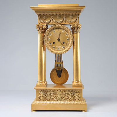 Large Charles X portico clock with pendulum in compensation beautiful quality of gilding