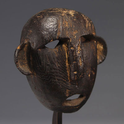 Bamileke mask, Cameroon, wood with dark patina