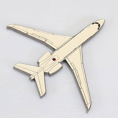 DASSAULT AVIATION. Paperweight in cut, chromed and painted steel