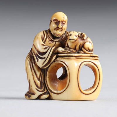 Netsuke carved - a character and an animal. Japan Edo period