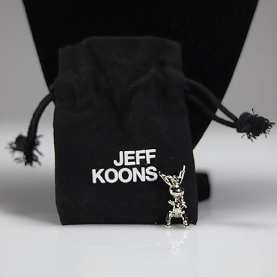 Jeff Koons. Rabbit. Silver metal pendant. Sold with its original pouch marked Jeff Koons.