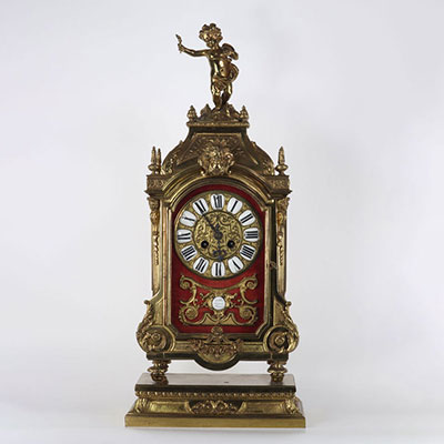 Imposing pendulum and its very finely chiseled gilt bronze base, enamelled dial on a red background signed PARIS LEROLLES FRERES