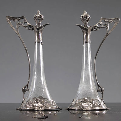 Pair of Art Nouveau carafes with floral decoration and young women 1900