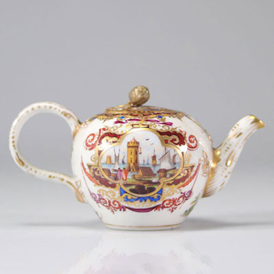 18th century porcelain teapot with Dutch port decor, brand R in blue under the piece