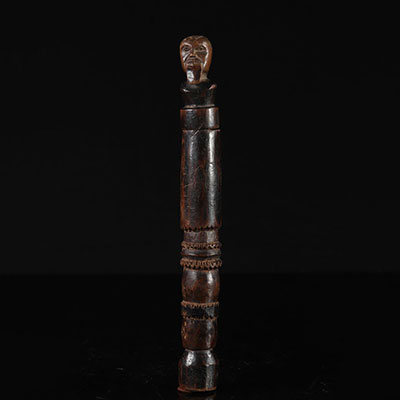 Carved wooden knife surmounted by a man's head, original wear and patina. Africa (DRC)