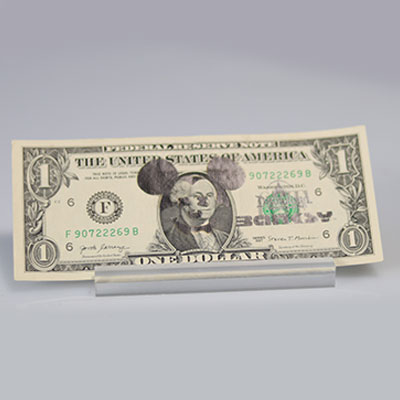 BANKSY (born in 1974), in the style of Dismal dollar Stamps on genuine one dollar bill Signature stamp and stamp of Dismaland on the right