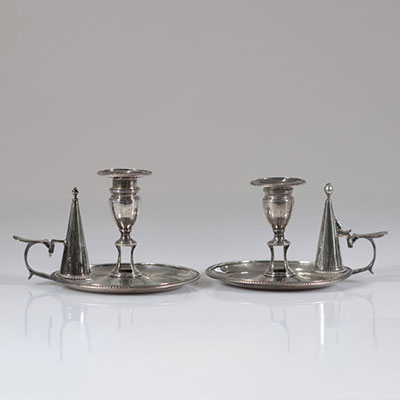 Pair of silver hand candlesticks with English hallmarks
