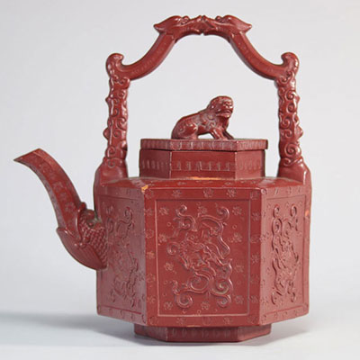 Chinese red stoneware teapot decorated with dragons