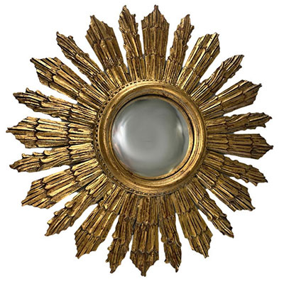 Grand miroir soleil en bois sculpté et doré