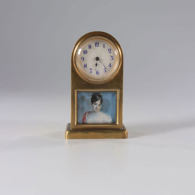 Miniature clock decorated with a painted young woman