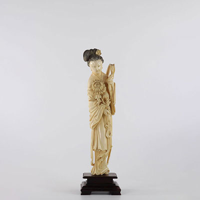 China sculpture of a young woman carrying a flower circa 1900
