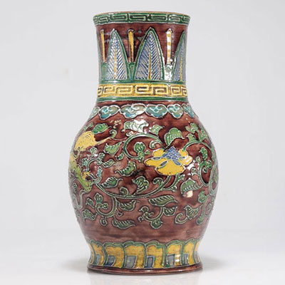Glazed stoneware vase with yellow background decorated with dragons
