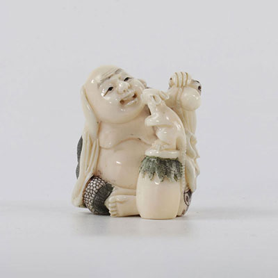 Netsuke carved of a character with a rat circa 1920