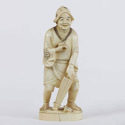 Japan ivory okimono carved with a character circa 1900 signed