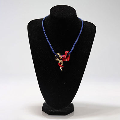 Niki de Saint Phalle Pendant. “Snake Dance”. Represents two intertwined snakes in gilded bronze and painted polychrome by hand. Blue drawstring choker.