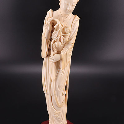 CHINA - carved young lady  with a bunch of flowers