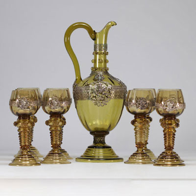 (9) Germany - Römer, set of nine wine glasses and a decanter, silver (?) frame, circa 1900.
