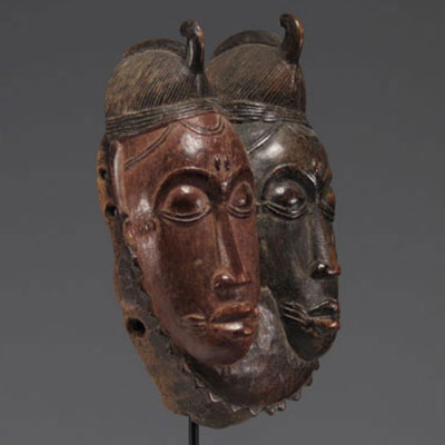 Double mask with Baoulé twins, Ivory Coast, wood and polychromy.