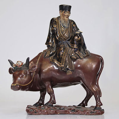 Chinese sculpture in glazed clay Lao Tseu on an ox