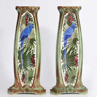 Pair of art-deco columns decorated with blue macaws, K G Lunéville, signed - circa 1930
