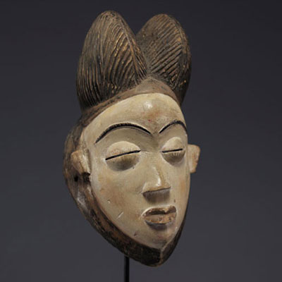 Punu, Gabon, Okuyi mask with a kaolin and padouk female face