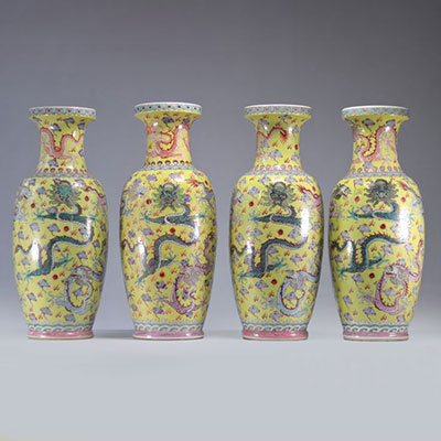 Vases (4) in Chinese famille rose porcelain decorated with dragons on a yellow background