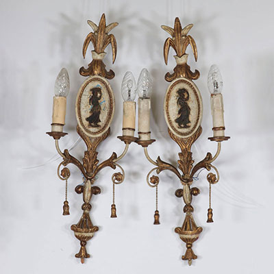 Pair of wall lights with polychrome wood medallions