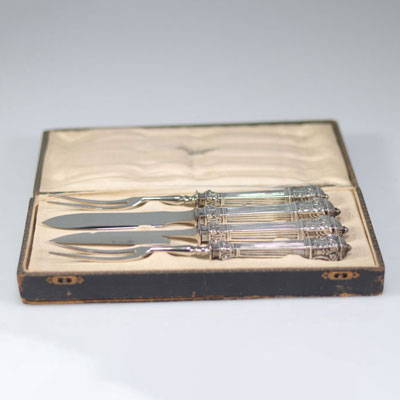 Silver cutlery in their cases