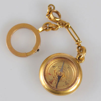Compass in yellow gold (18k) and chain (18.2gr)