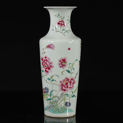 Cylindrical vase with flared neck in porcelain, famille rose decorated with birds and flowers. CHINA, 18th century.
