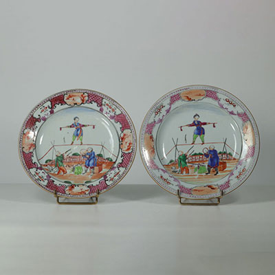 China - pair of famille rose porcelain plates with 18th century acrobats decoration