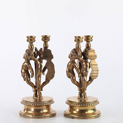 Arman Fernandez Angelots Pair of gilded candlesticks polished 1991. Cut bronze proof with gilded patina. Bocquel founder. Signed on the 