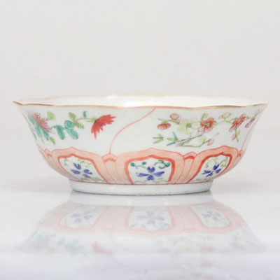 Porcelain bowl with famille rose floral decoration mark under the piece