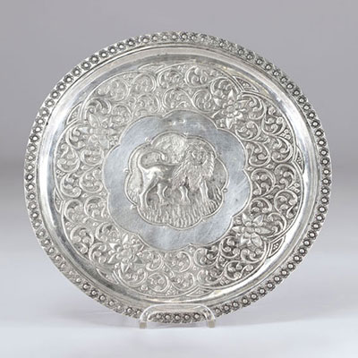 Silver dish in the center a lion probably India