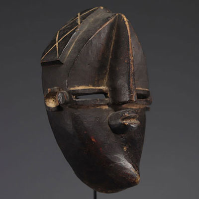 “Mfondo” mask, Lwalwa, DRC Wood with dark brown patina.