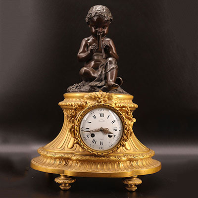 Bronze clock with two patinas the flute player