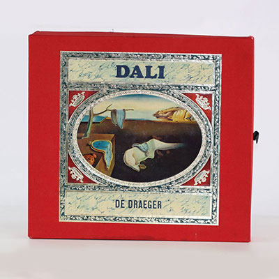 Salvador Dali Dali de Draeger. 1968 In-4° carré, toile rouge ornée d'une montre molle métallique, sous  coffret toilé rouge illustré de l'éditeur.